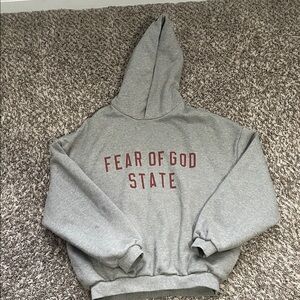 Fear of God Gray Hoodie with Red Lettering